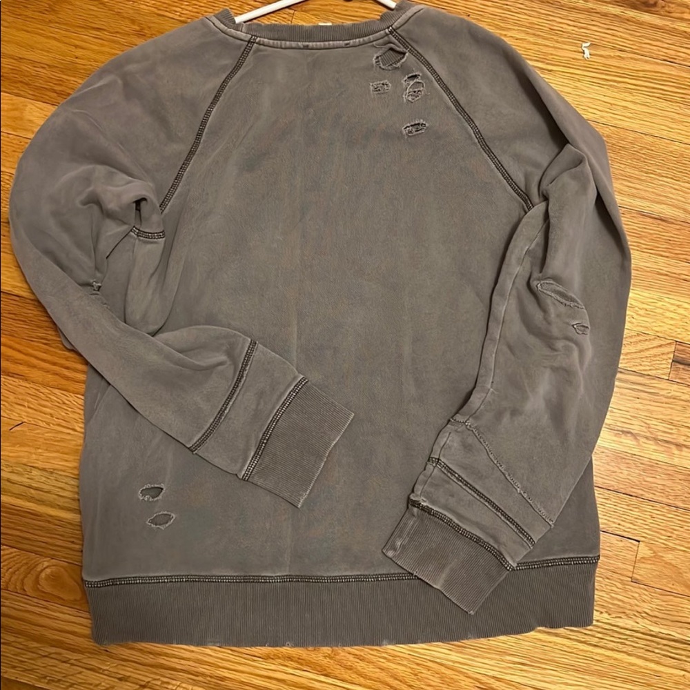 Tattered and distressed pullover